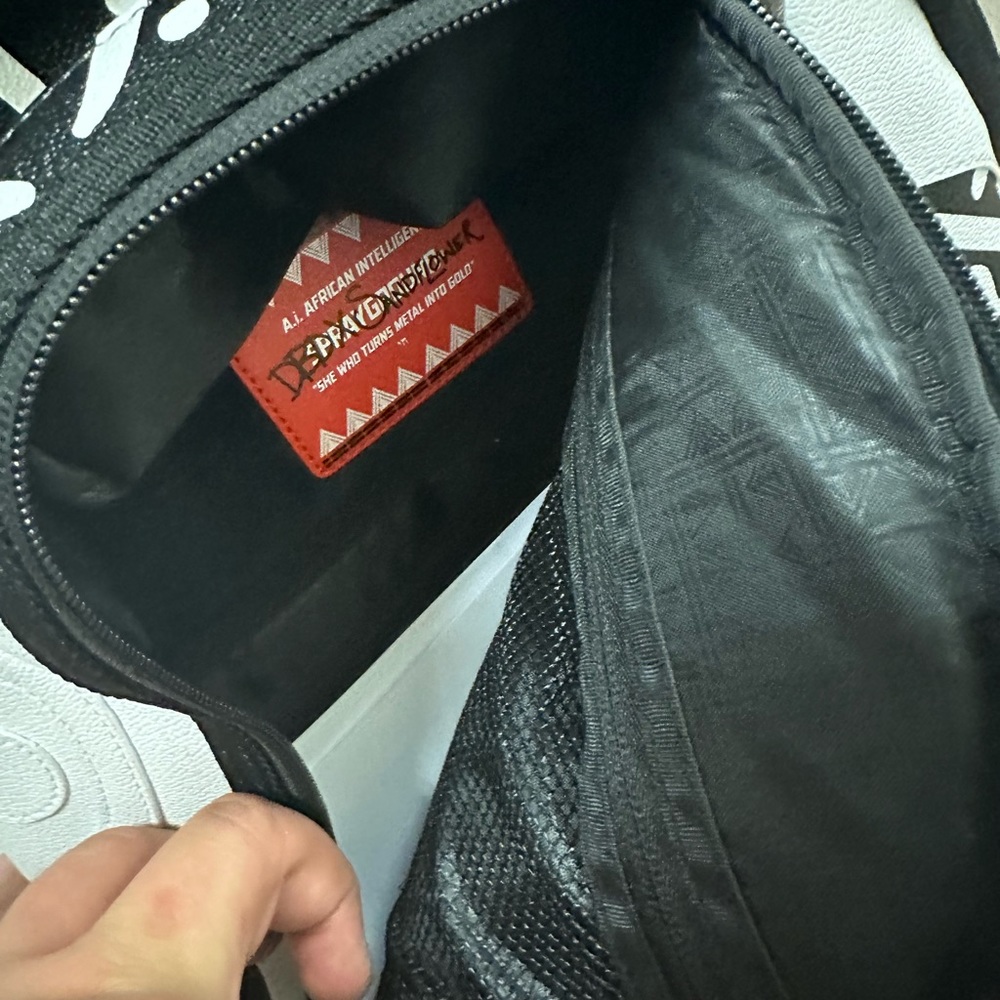 SprayGround black and white backpack